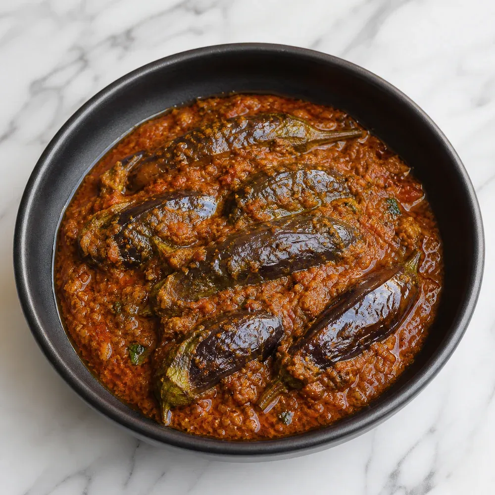 Asian baby eggplant in the chef's classic tomato-based gravy.