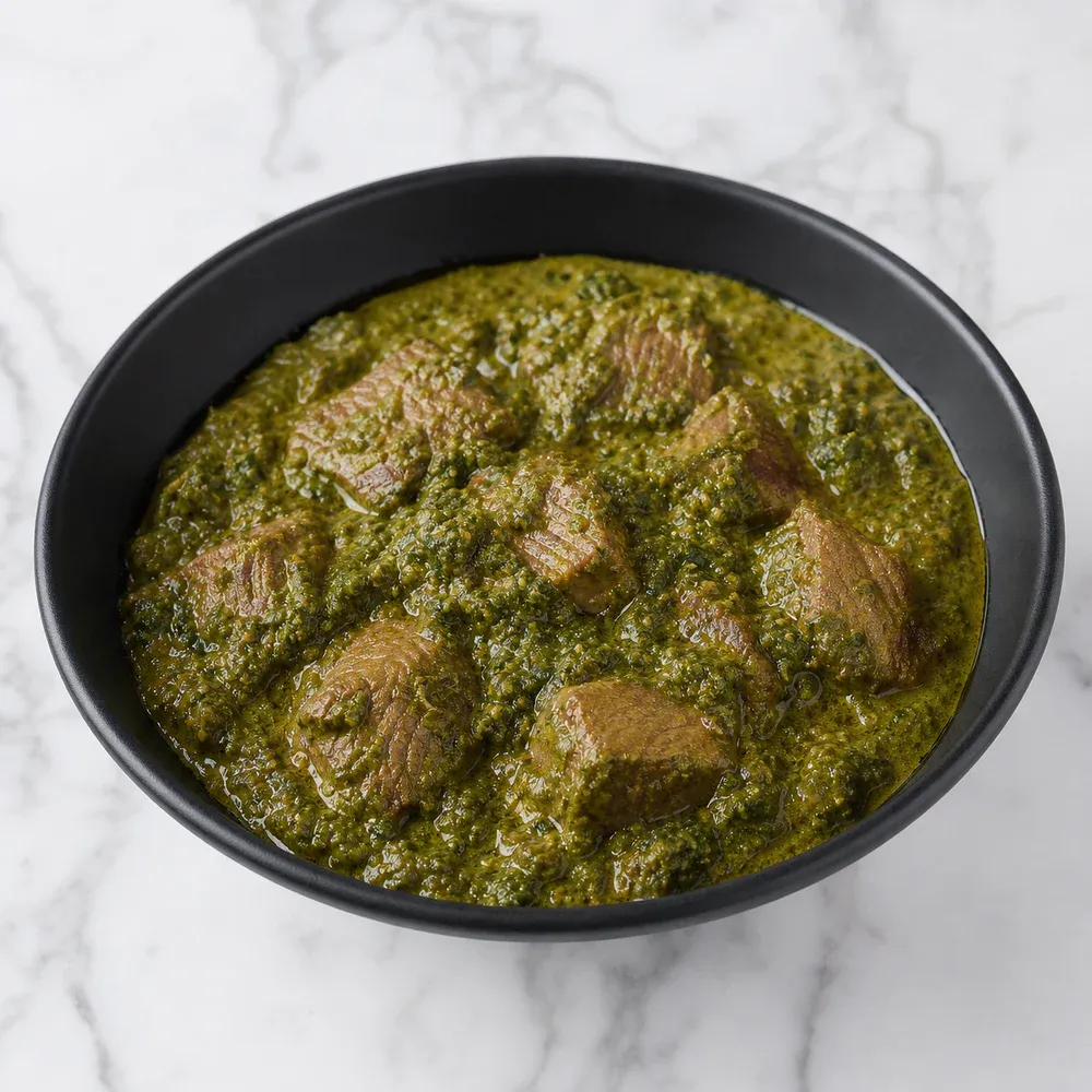 AAA sirloin steak chunks cooked in a creamy spinach sauce.