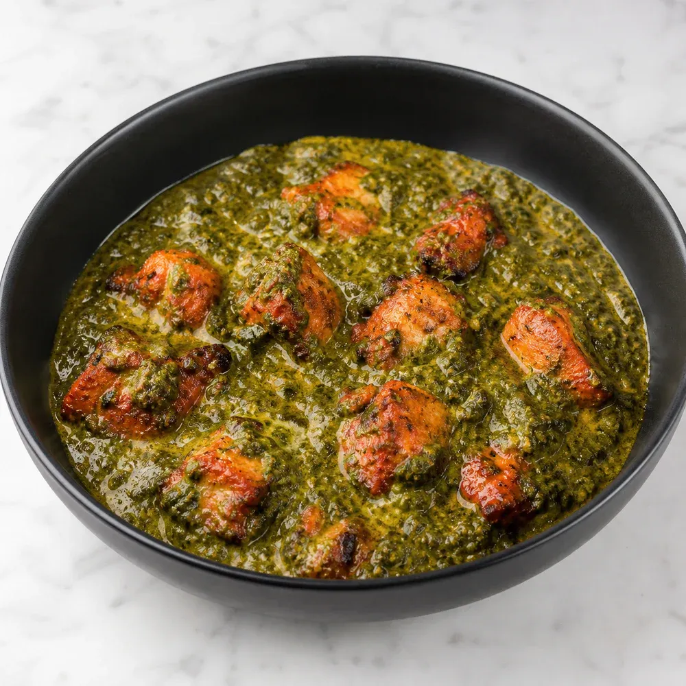 Chicken tikka in a spiced, creamy spinach sauce.