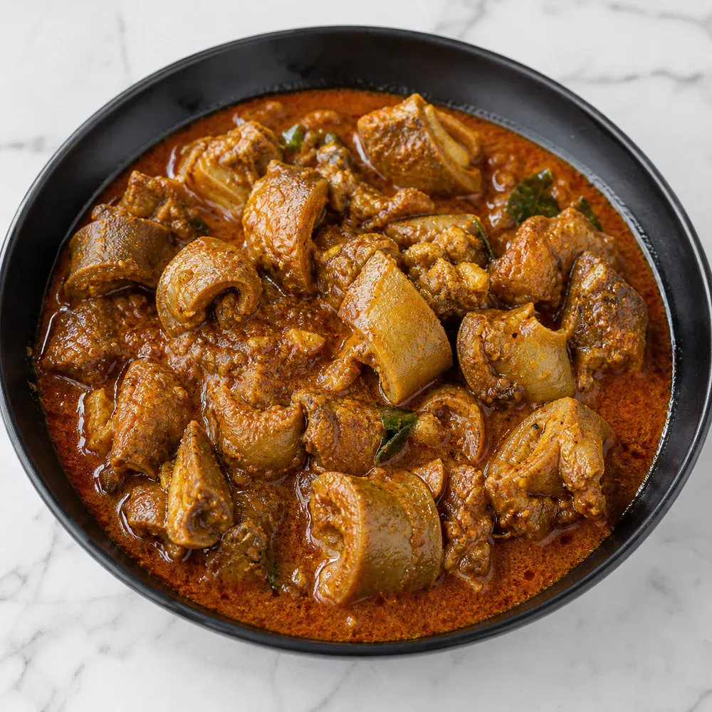 Goat cubes cooked in a blend of chili-infused curry spices.