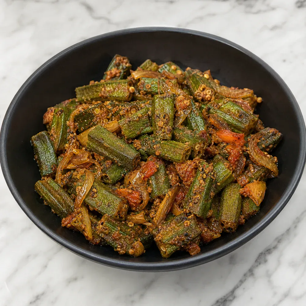 Okra cooked homestyle with spices, onions, and tomatoes.