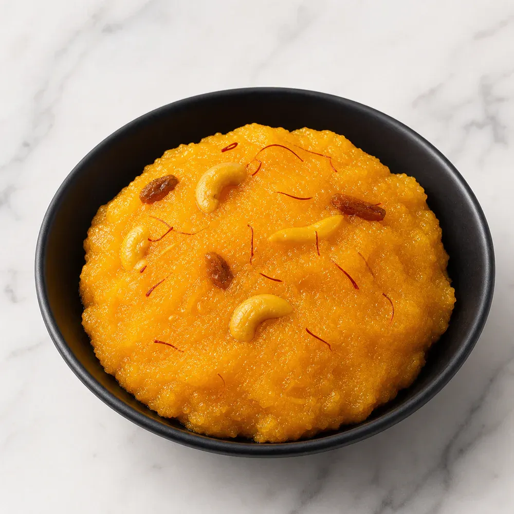 A sweet semolina pudding flavored with mango and cardamom.