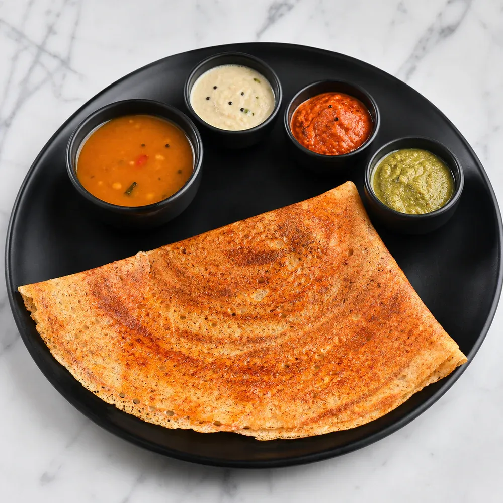 Extra-thin, crispy dosa roasted with aromatic ghee.